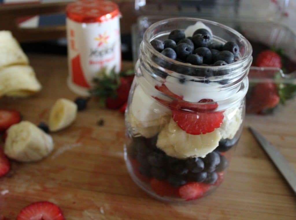 Help make yout holiday even more festive with my healthy Red White and Blue Mason Jars that are easy to create and make portable yumminess.