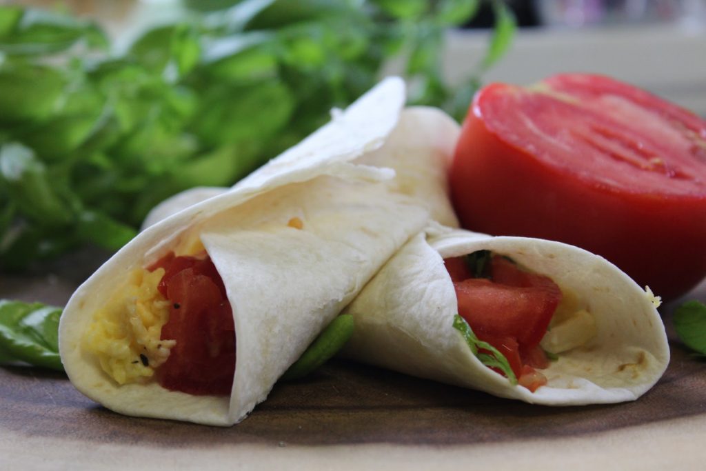 For busy families on the go, don't skip the most important meal of the day. Do breakfast on the go with these tomato basil breakfast burritos.