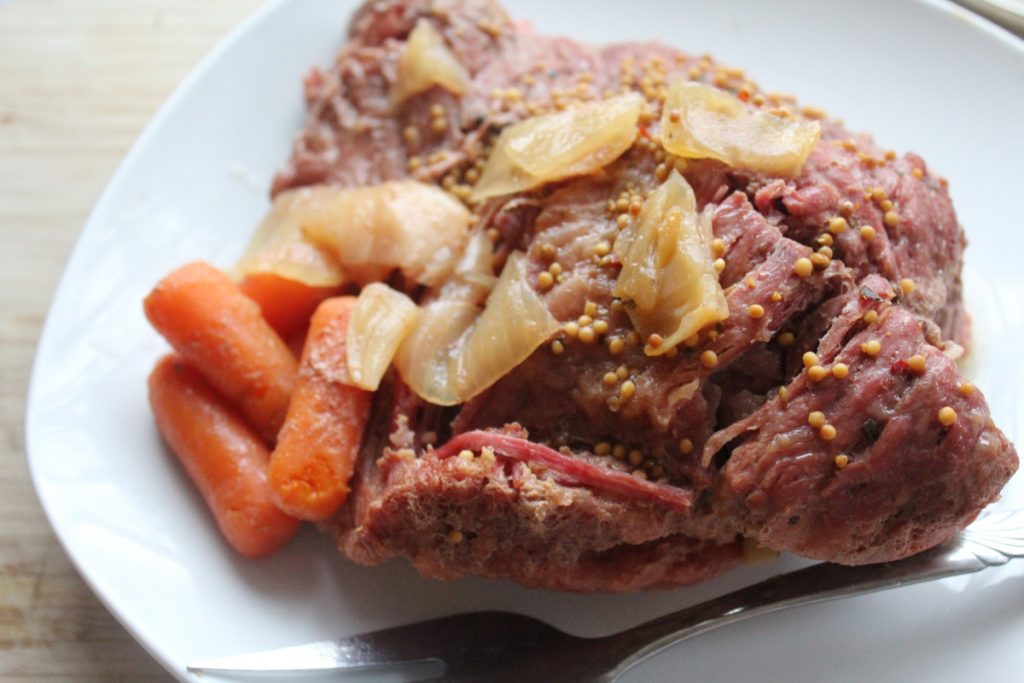 Celebrate the luck of the Irish with this St. Patrick's Day inspired Slow Cooker Corned Beef and Vegetables which is like a pot of gold on a plate.